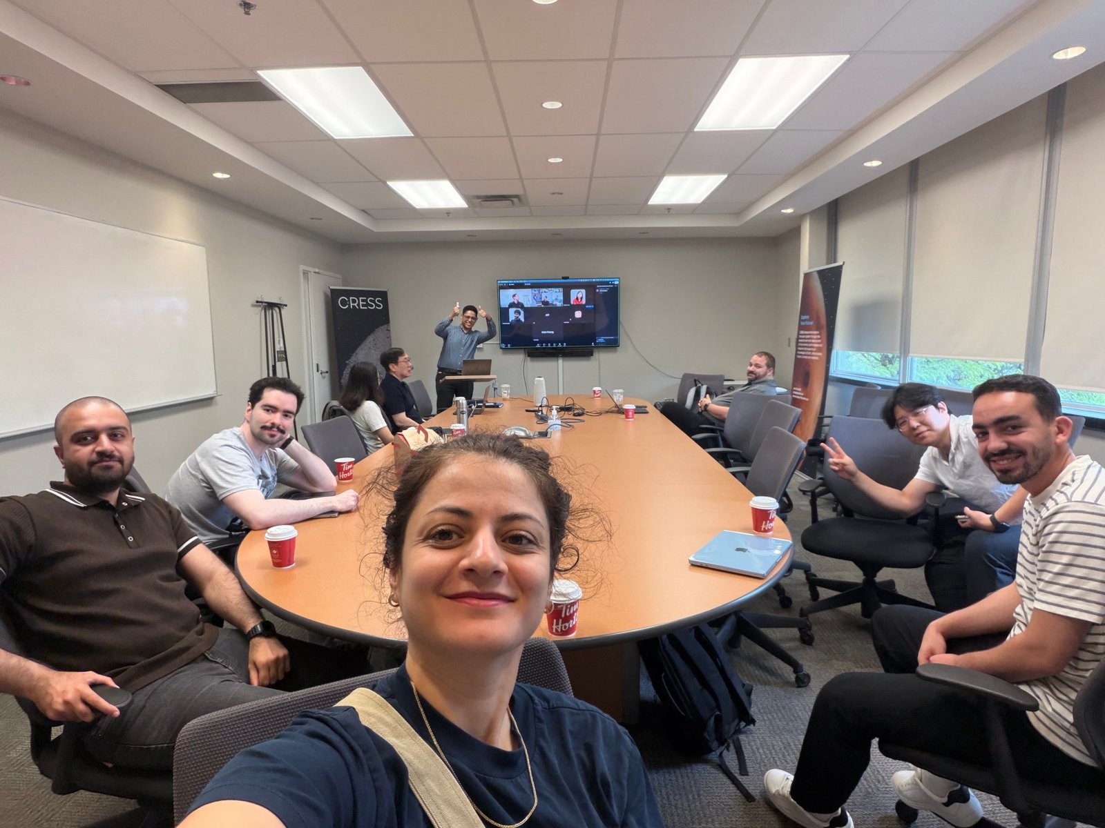 Lab members cheering after Youssef Korny's M.Sc. defence